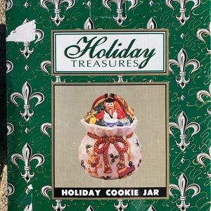Holiday Treasure you bag cookie jar with bow.